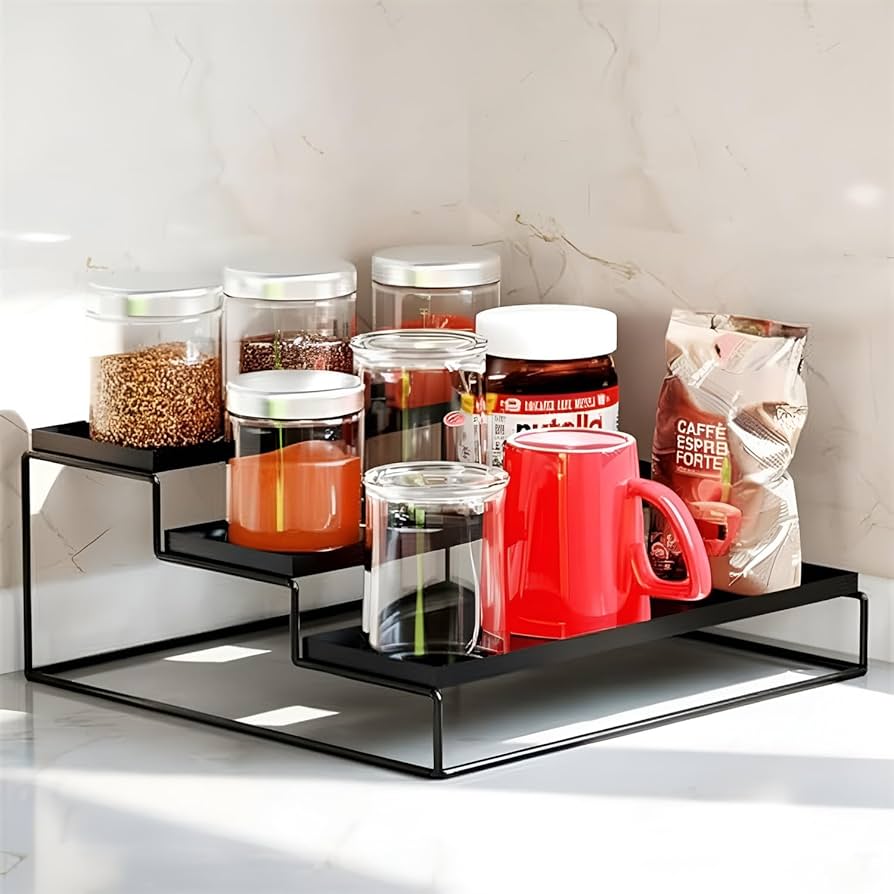 Glass jar being filled with thin slices of turmeric, neatly layered, on a kitchen countertop.